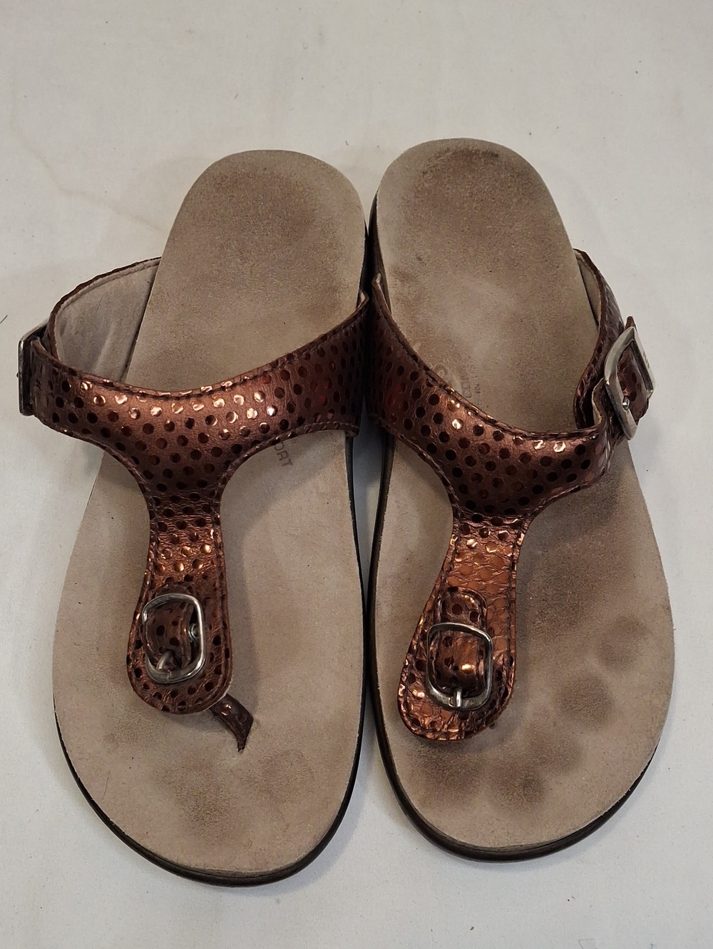 SAS Sanibel Metallic Bronze Gold Thong T Strap Sandals with Gold Buckle Detail.